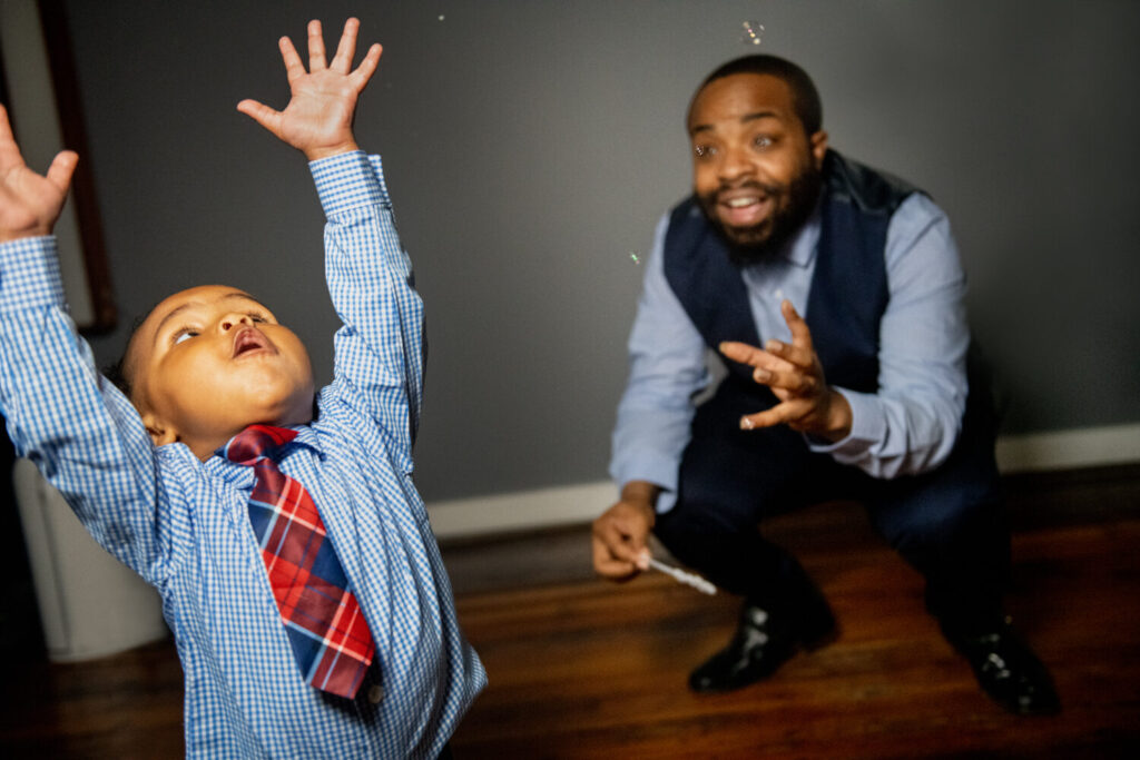 A Fathers' UpLift client with his son. Photo courtesy of Fathers' UpLift.